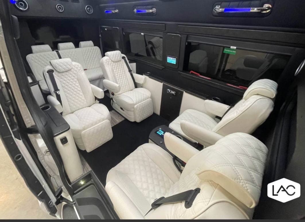 Inside the Jortevsky mobile office: executive seating and a working surface